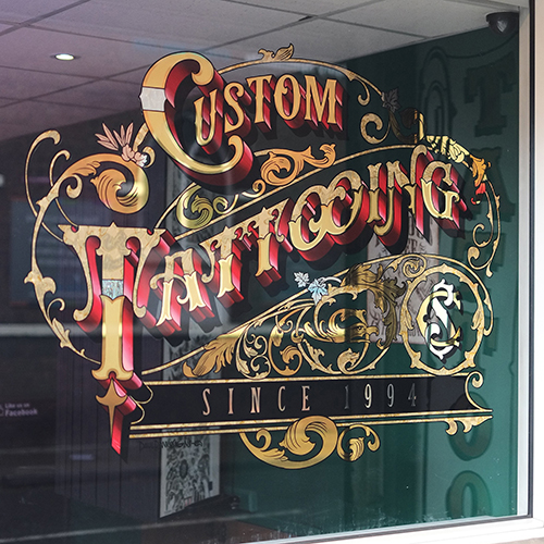 custom tattooing gold leaf sign by paul banks