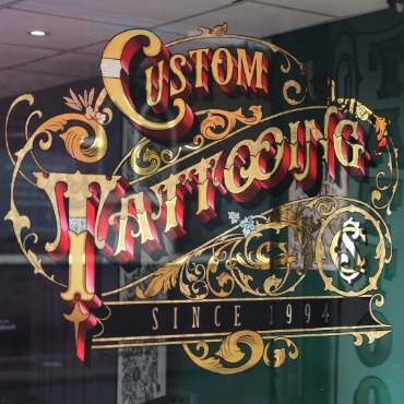 custom tattooing gold leaf sign by paul banks
