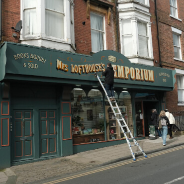 book shop sign mrs-lofthouses emporium