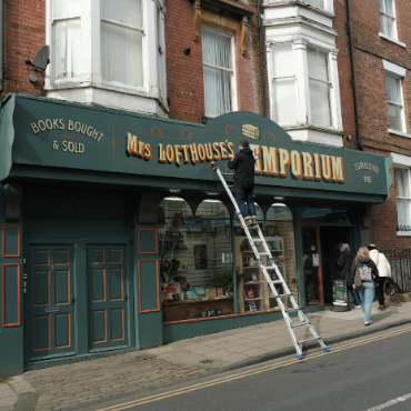 book shop sign mrs-lofthouses emporium